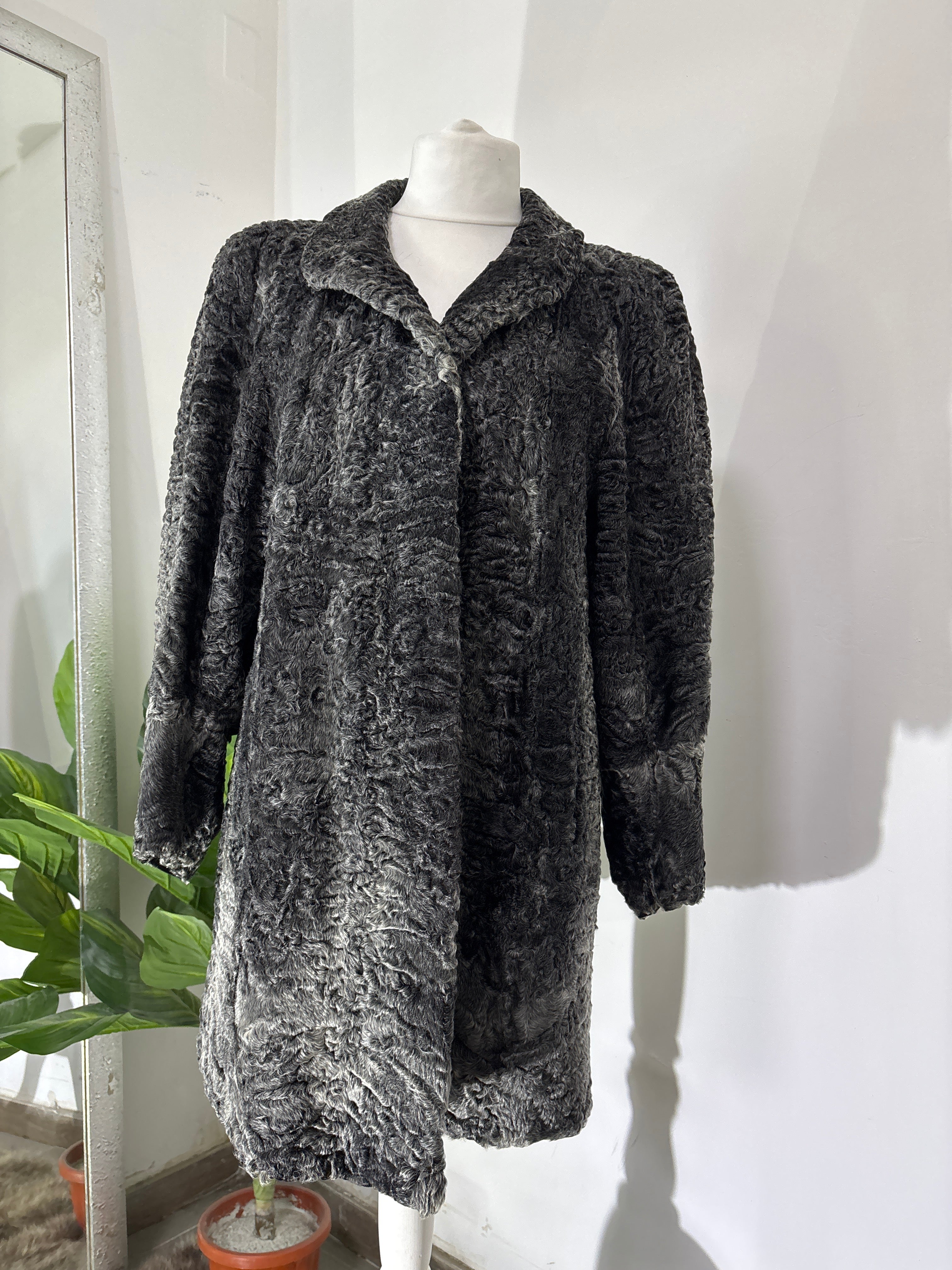 PELLICCIA IN ASTRAKAN GRIGIO 010